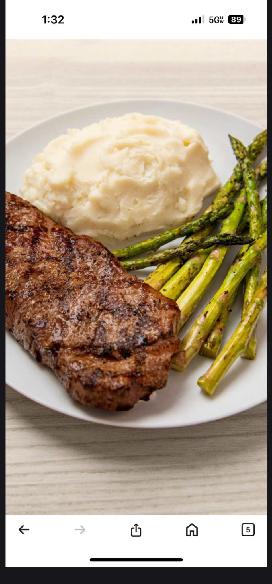 Grilled steak with mashed potatoes and asparagus
